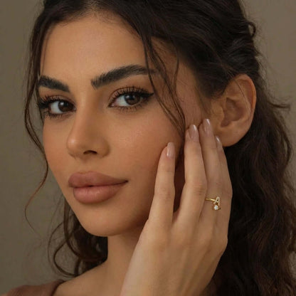 Iced Initial Signet Ring worn by model showcasing AUREATE brand's modern design and elegance.