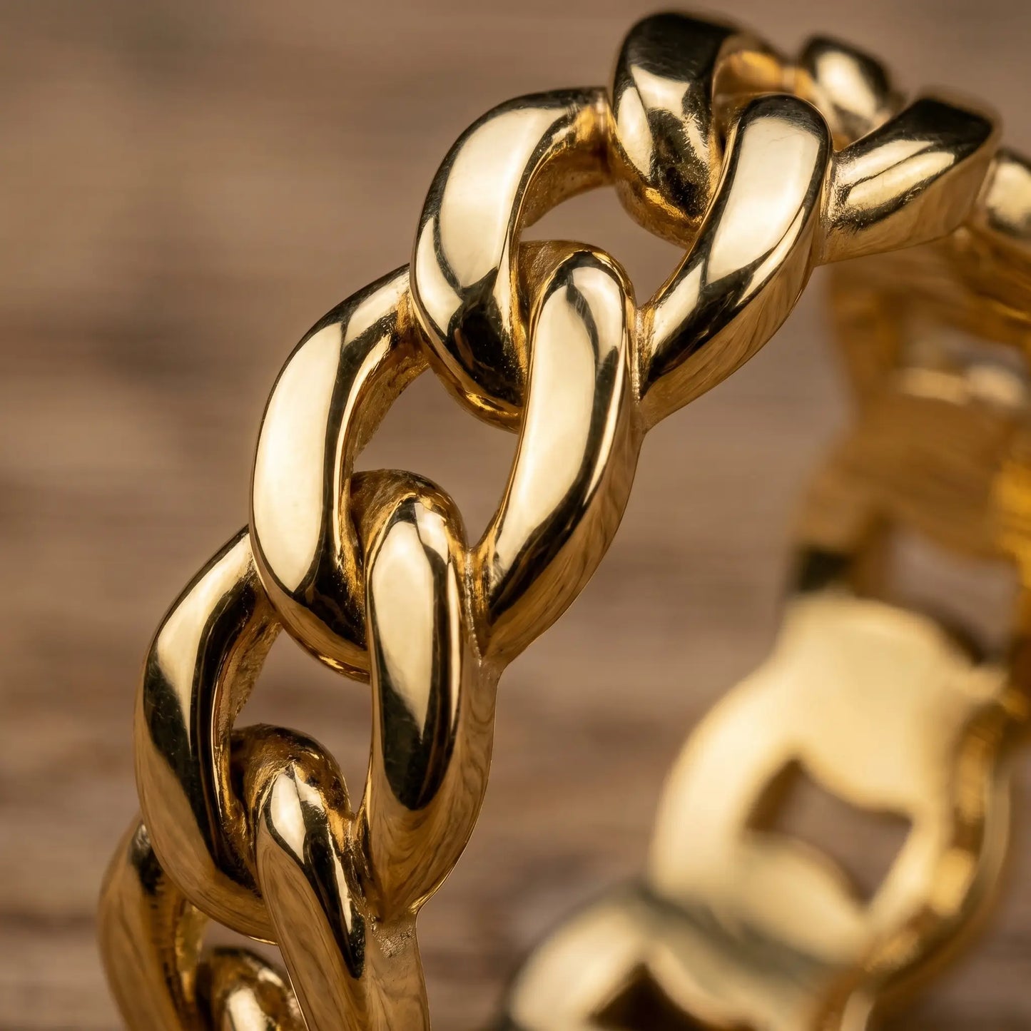Cuban Link Gold Band Ring - extreme macro detail of chain pattern