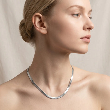 AUREATE 5mm Herringbone silver chain studio profile portrait