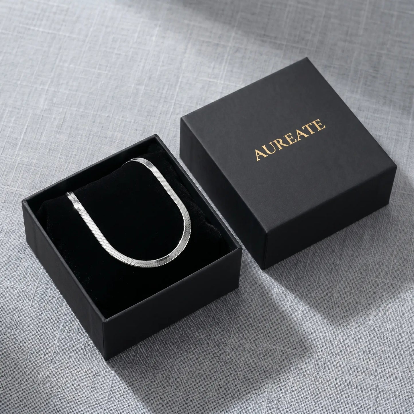 AUREATE 5mm Herringbone silver chain in matte black gift box with logo