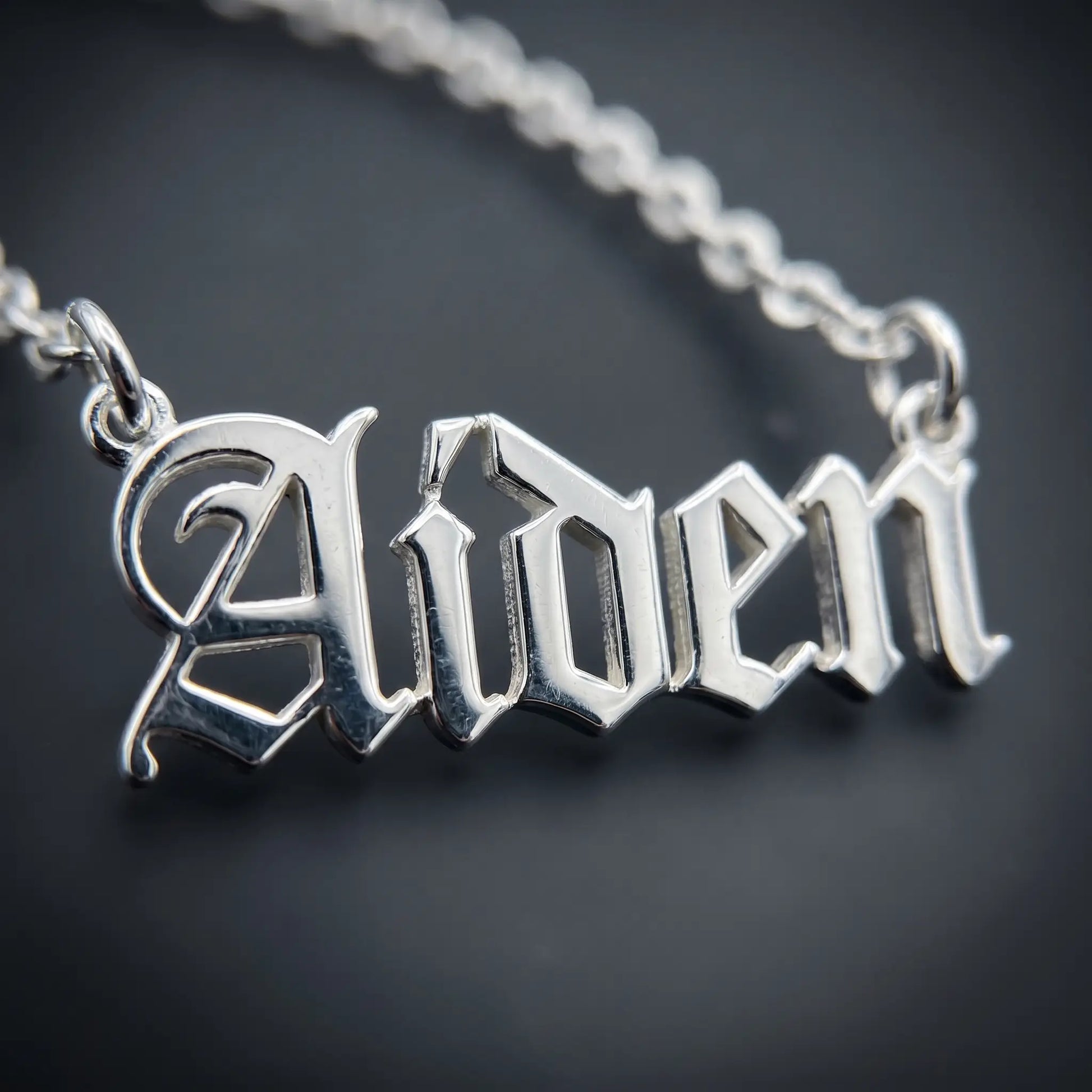 Old English Lettering Name Pendant — Stainless Steel (Silver Tone) — Macro detail — AIDEN