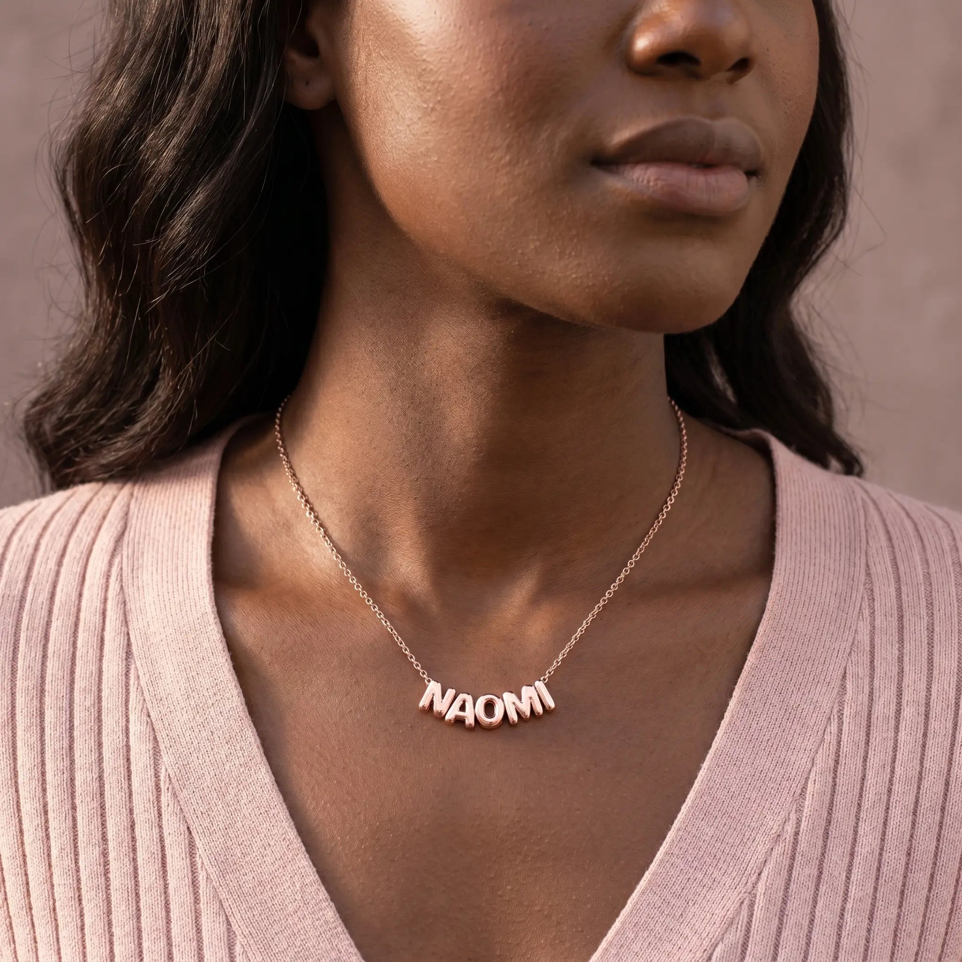 AUREATE Bubble Letter Name Chain Rose Gold NAOMI puffy 3D balloon letters worn close-up