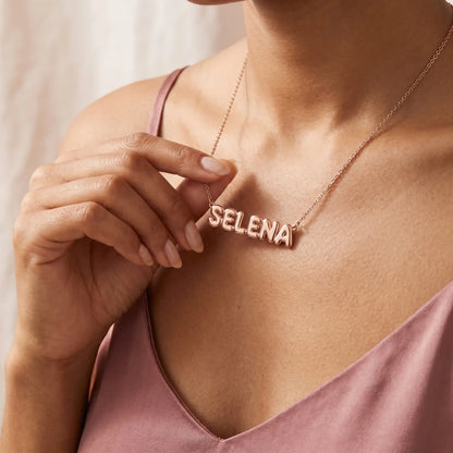 AUREATE Bubble Letter Name Chain Rose Gold SELENA hand-to-pendant intimate close-up