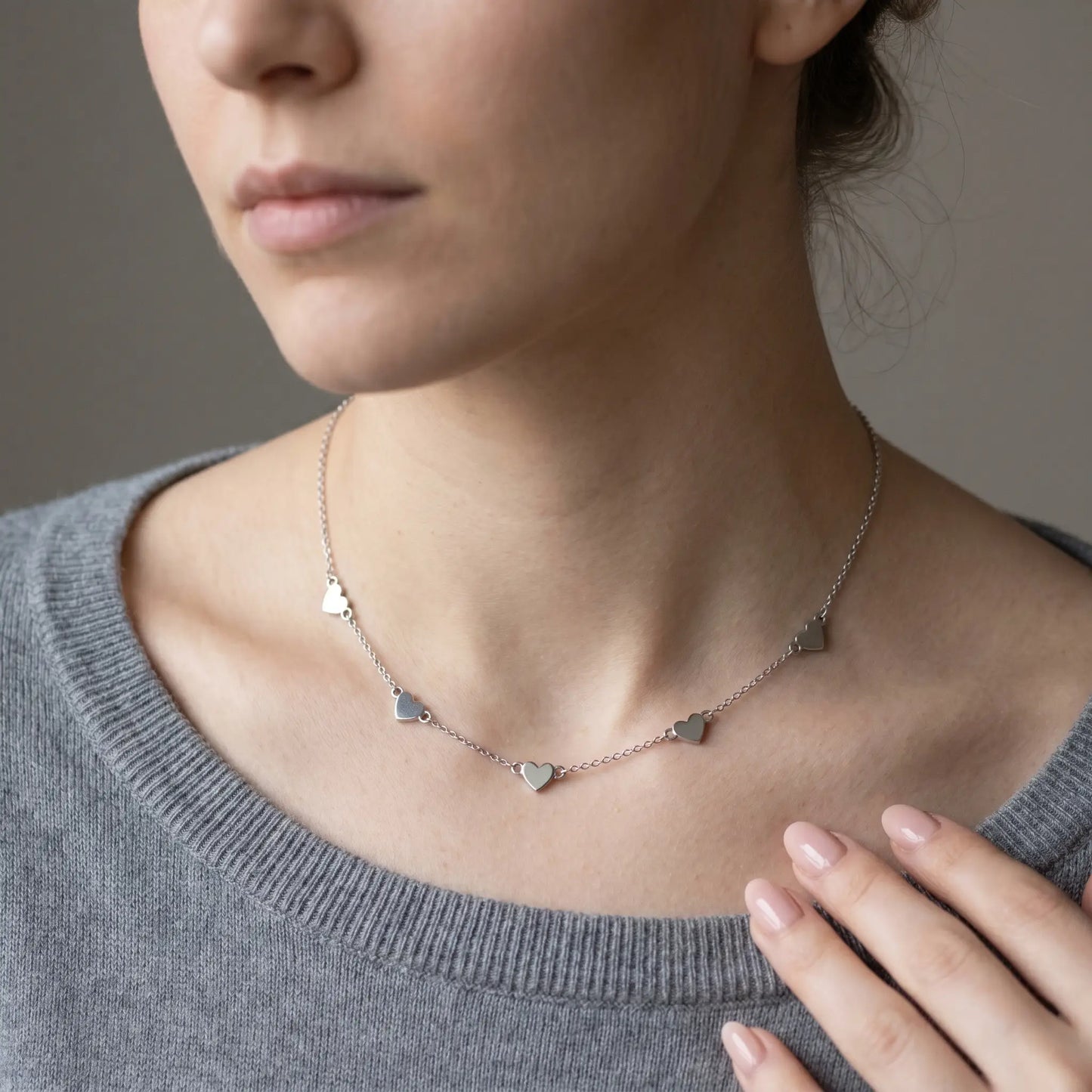 AUREATE Twin Heart Silver Multi-Heart Station Necklace stainless steel worn close-up French woman