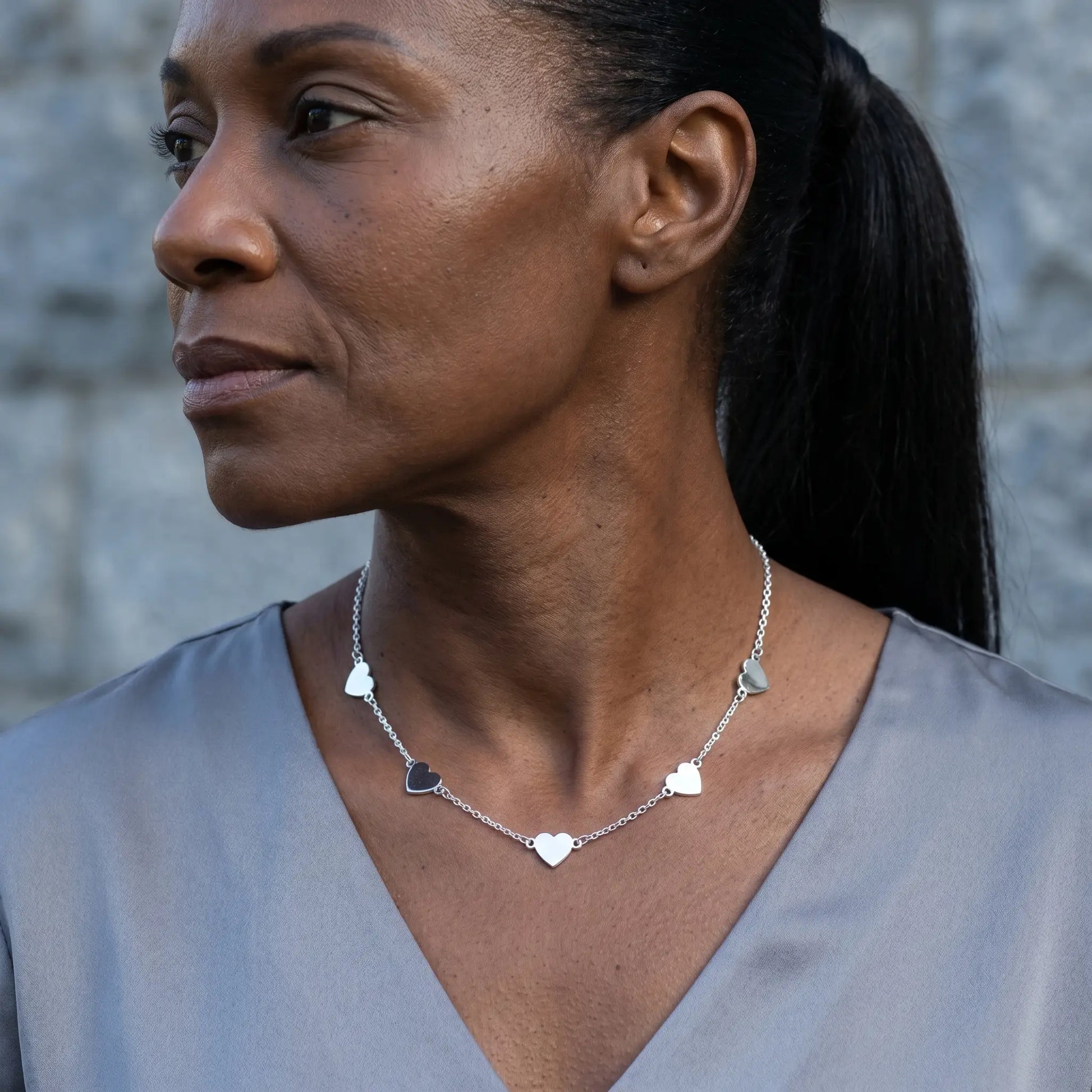 AUREATE Twin Heart Silver Multi-Heart Station Necklace stainless steel mature elegance 3/4 profile Black woman