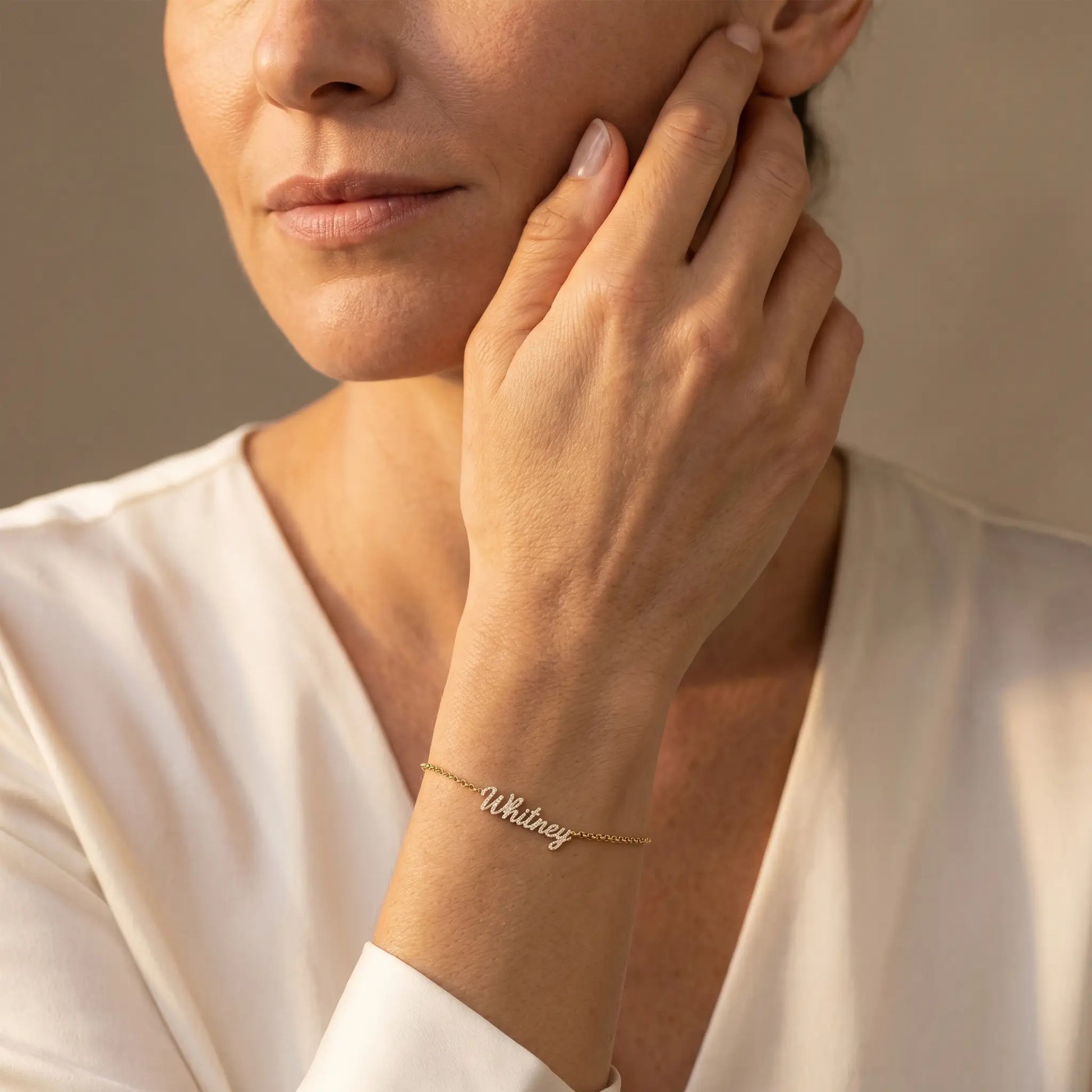 Crystal Name Wrist Chain in 18K Gold mature elegance hand-to-cheek - dainty crystal pave bracelet by AUREATE