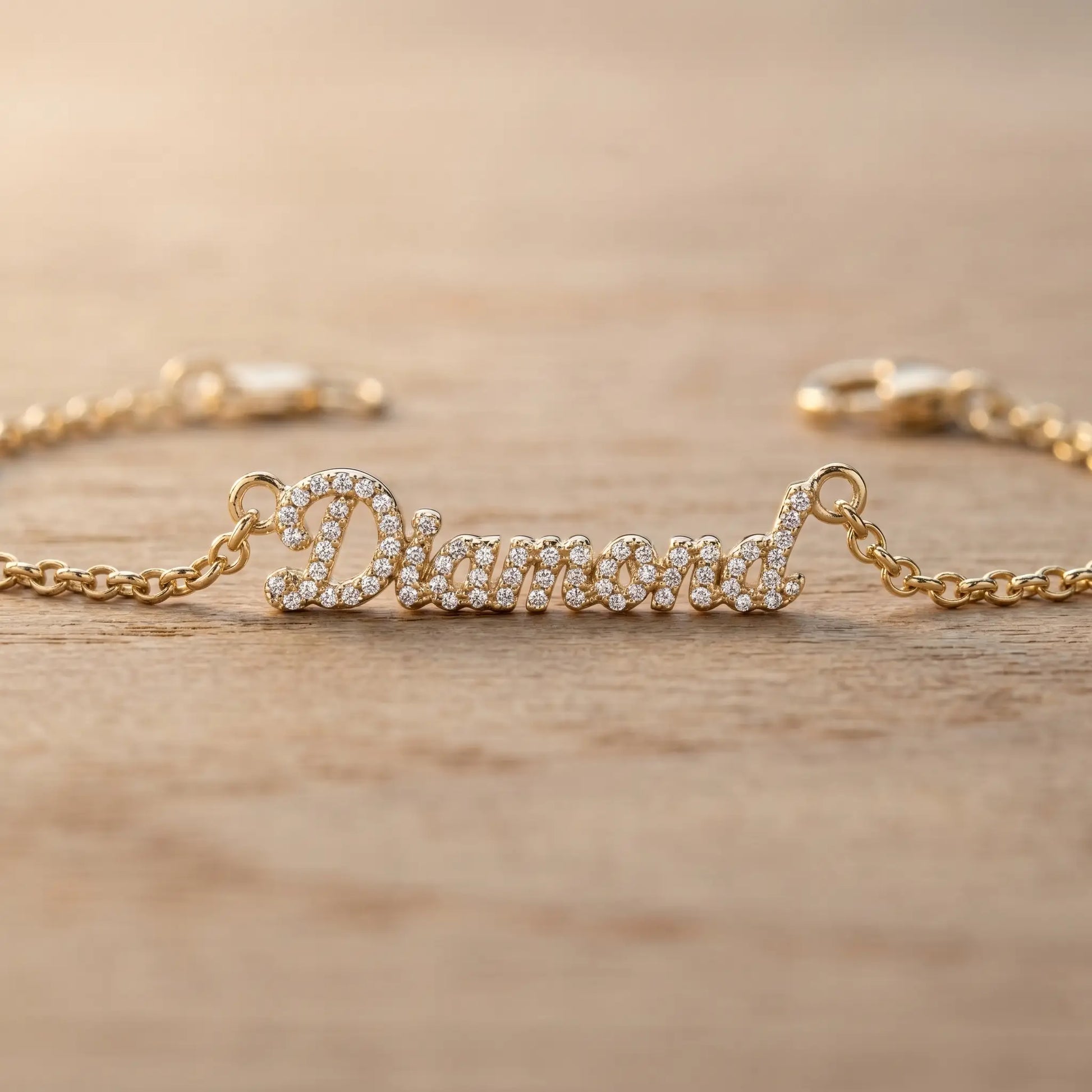 Crystal Name Wrist Chain in 18K Gold macro detail - extreme close-up of dainty pave crystals by AUREATE