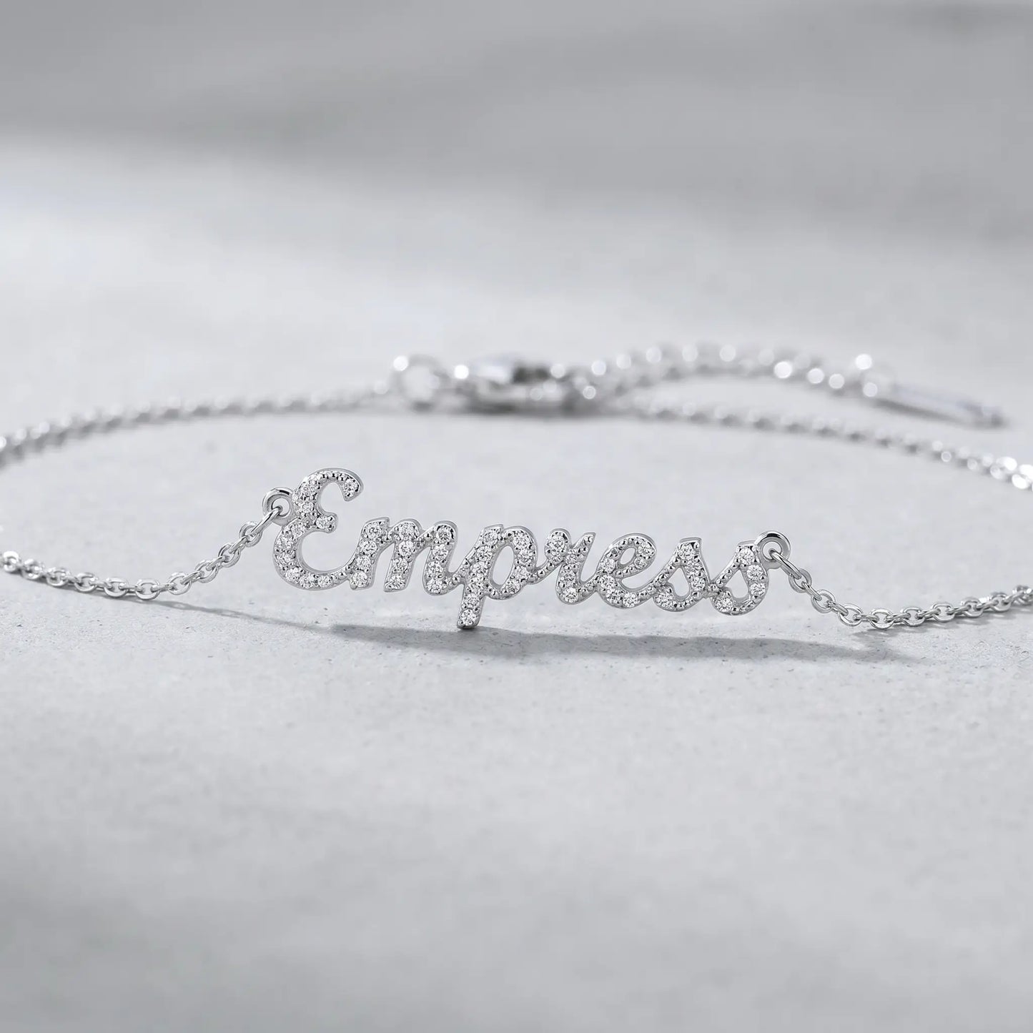 Crystal Name Wrist Chain in Silver macro detail - extreme close-up of dainty pave crystals by AUREATE