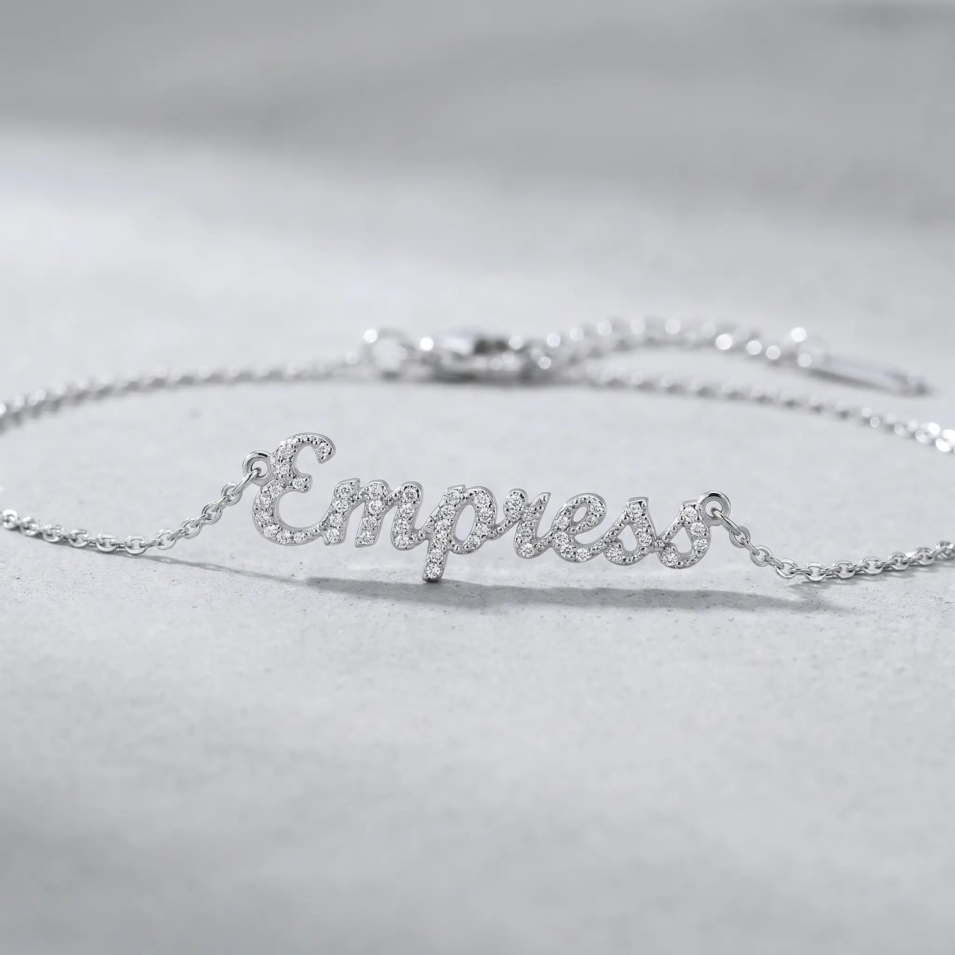 Crystal Name Wrist Chain in Silver macro detail - extreme close-up of dainty pave crystals by AUREATE