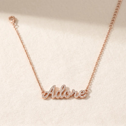 Crystal Name Wrist Chain in Rose Gold packshot - delicate rolo chain with iced cursive nameplate by AUREATE