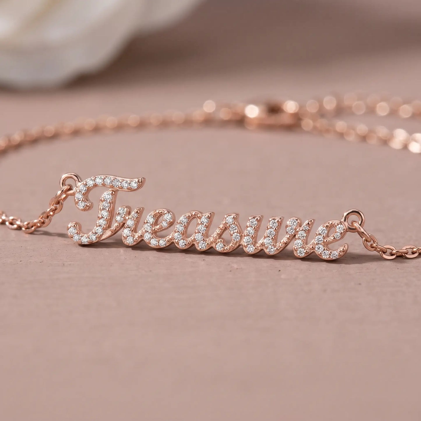 Crystal Name Wrist Chain in Rose Gold macro detail - extreme close-up of dainty pave crystals by AUREATE