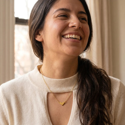 Timeless Heart Pendant Chain by AUREATE in 18K gold candid joy laughter lifestyle