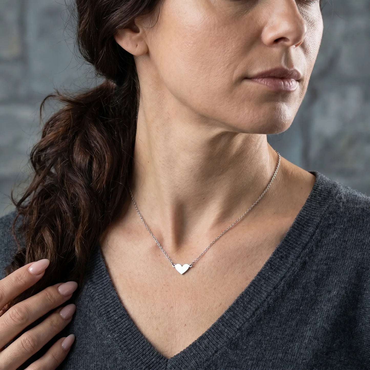 Timeless Heart Pendant Chain by AUREATE in silver tone worn 3/4 profile mature elegance