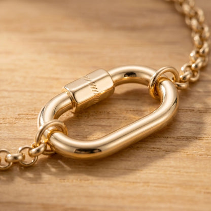 Oval Buckle Charm Bracelet gold macro pendant detail