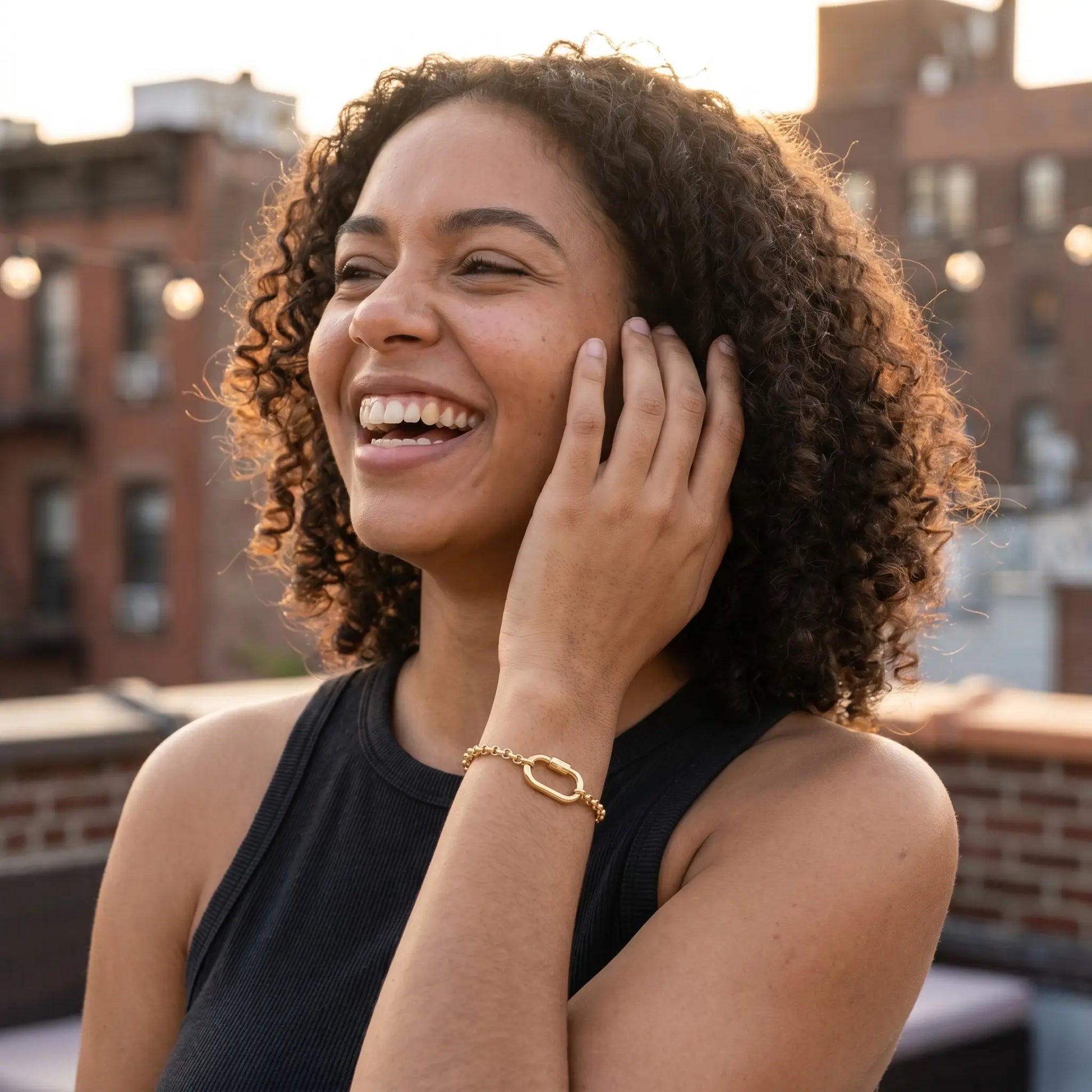 Oval Buckle Charm Bracelet gold lifestyle candid laughter