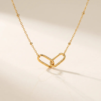 Linked Loop Necklace 18K gold packshot hero studio