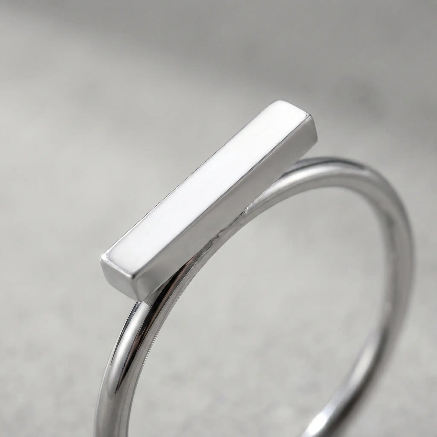 Mini bar ring silver stainless steel macro detail