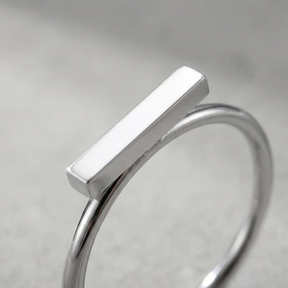 Mini bar ring silver stainless steel macro detail