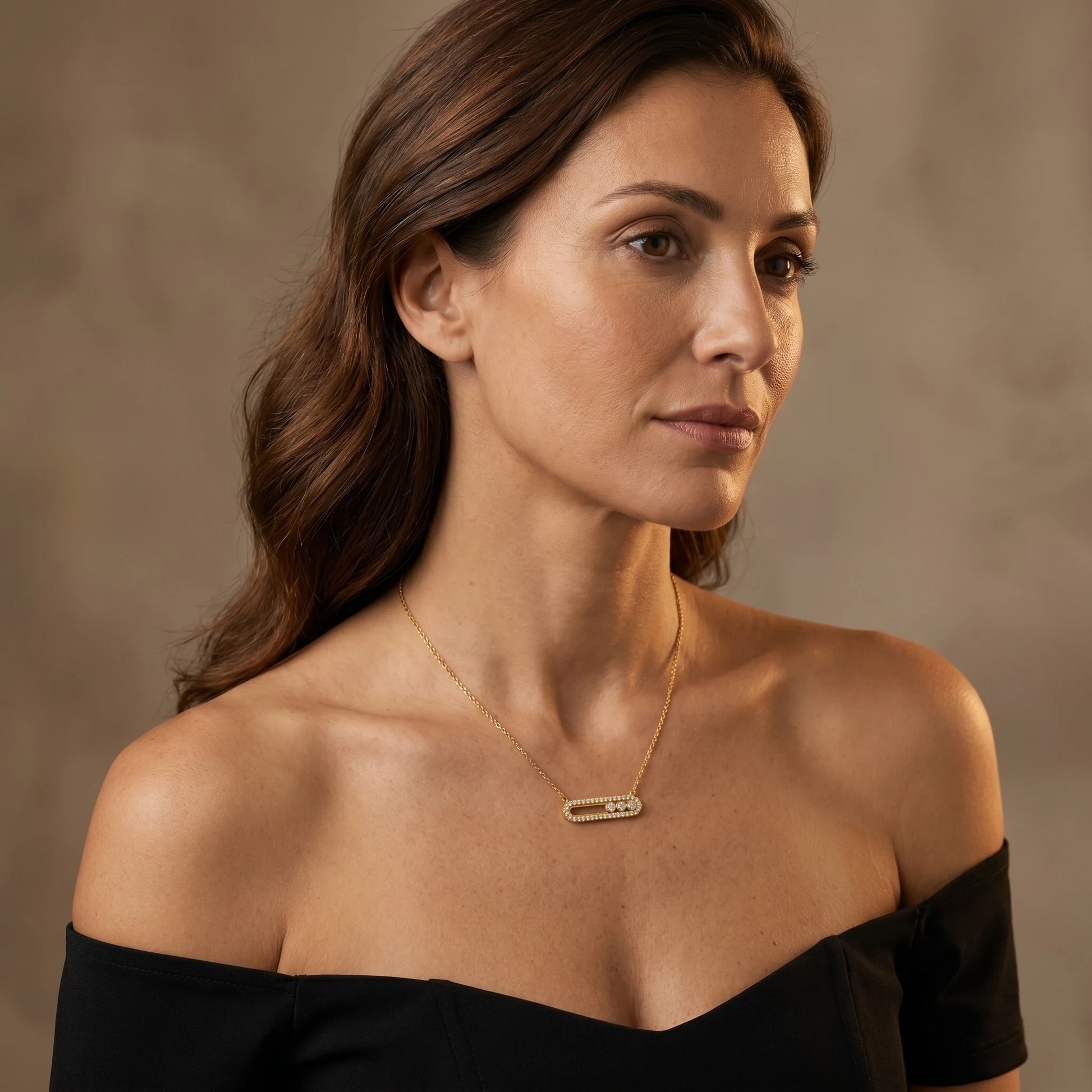 Dainty gold pavé bar necklace styled with black off-shoulder bustier editorial portrait
