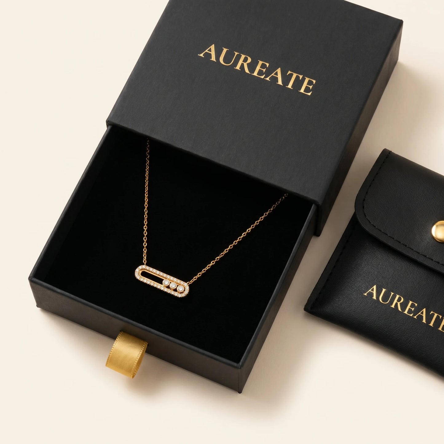 AUREATE gold paperclip pavé necklace in matte black slide-drawer gift box with leather pouch
