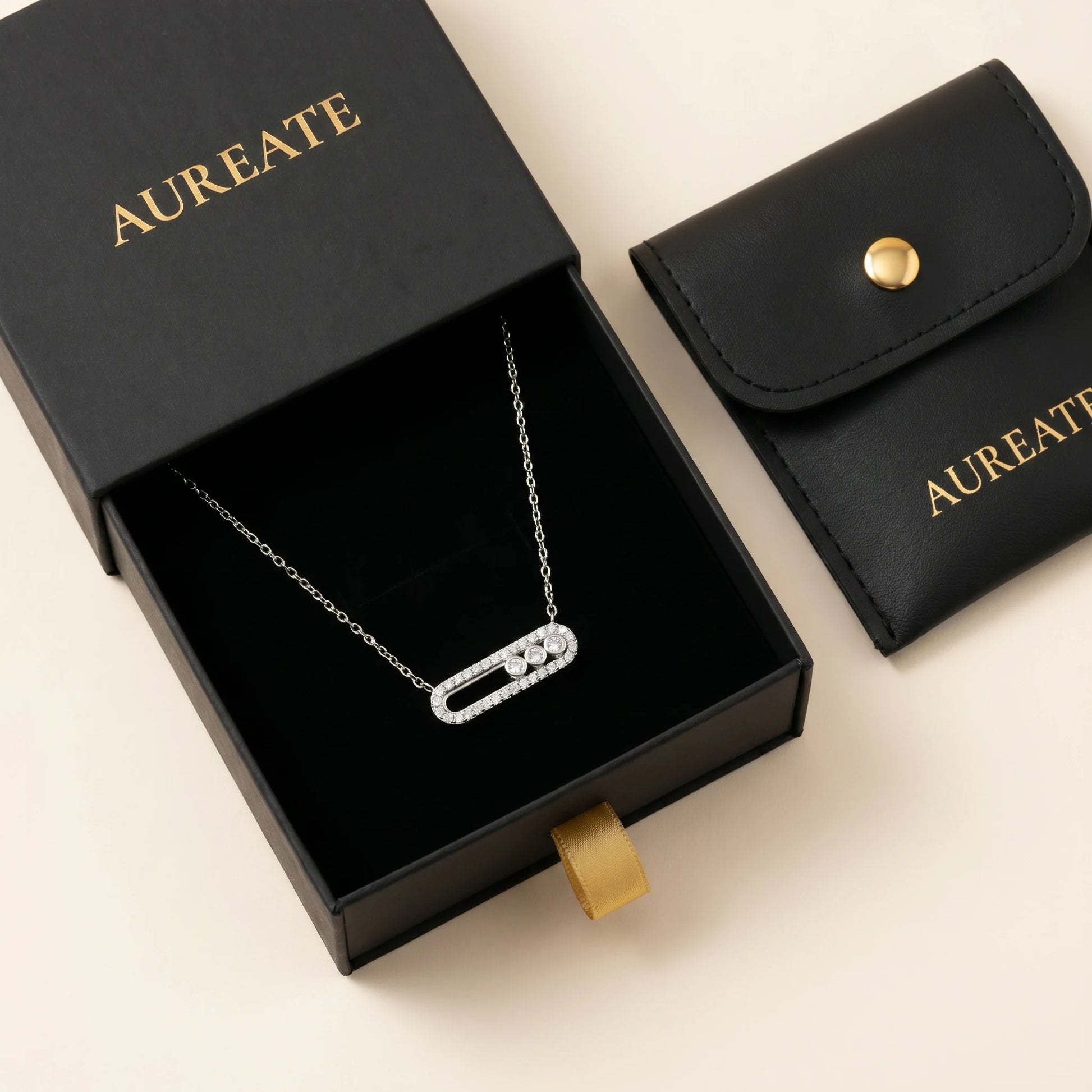 AUREATE silver paperclip pavé necklace in matte black slide-drawer gift box with leather pouch, gold AUREATE serif logo