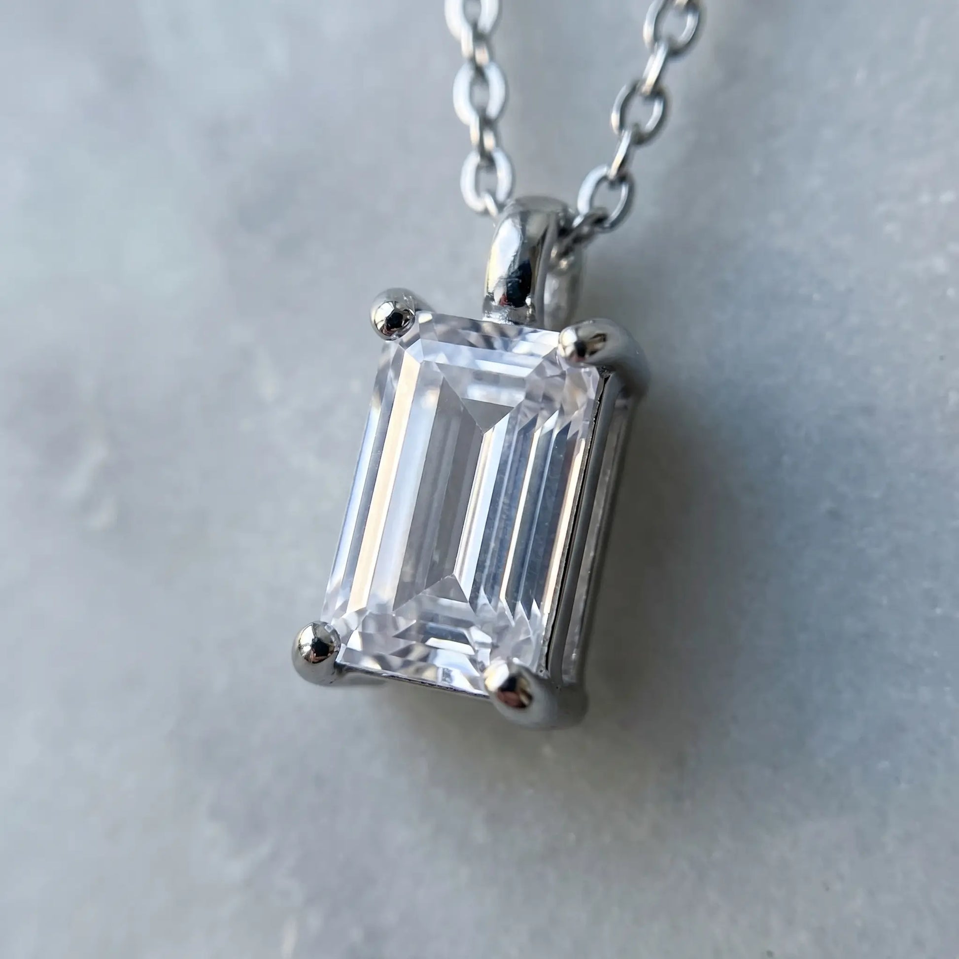 Baguette pendant necklace silver macro detail