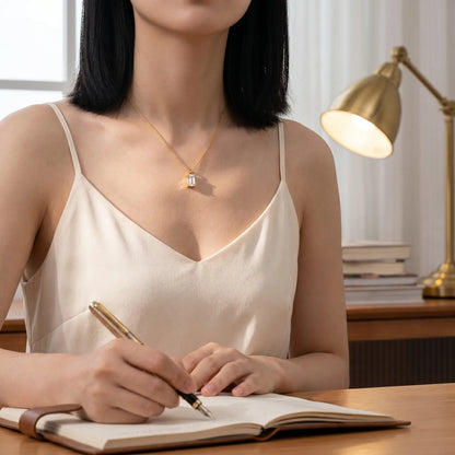 Baguette pendant necklace gold lifestyle writing