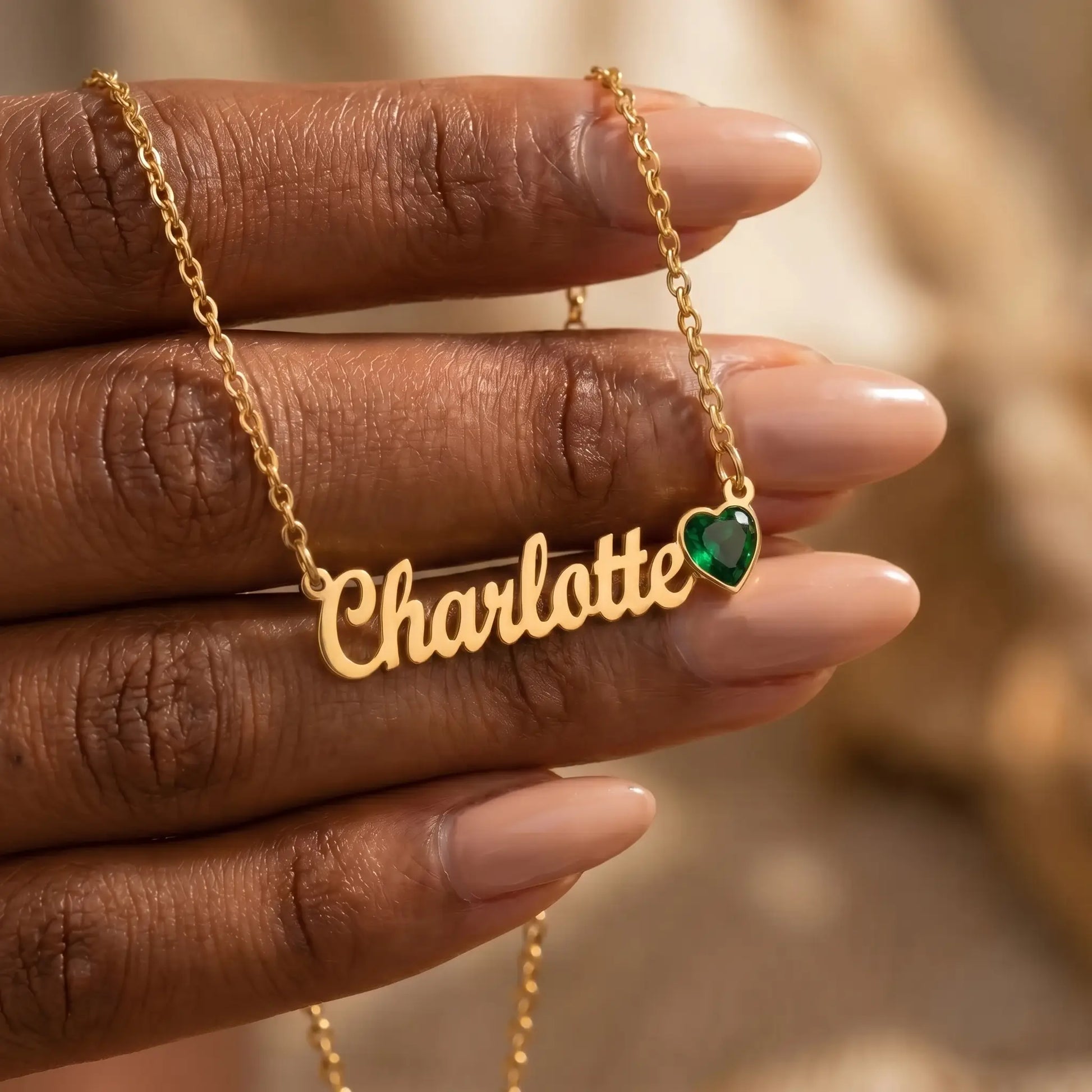 Birth Stone Letter Drop Strand 18K Gold hand-to-jewelry intimate with Charlotte cursive name and May Emerald heart birthstone