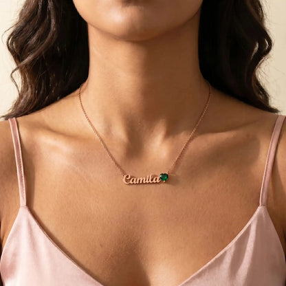 Birth Stone Letter Drop Strand Rose Gold worn close-up with Camila and May Emerald heart birthstone