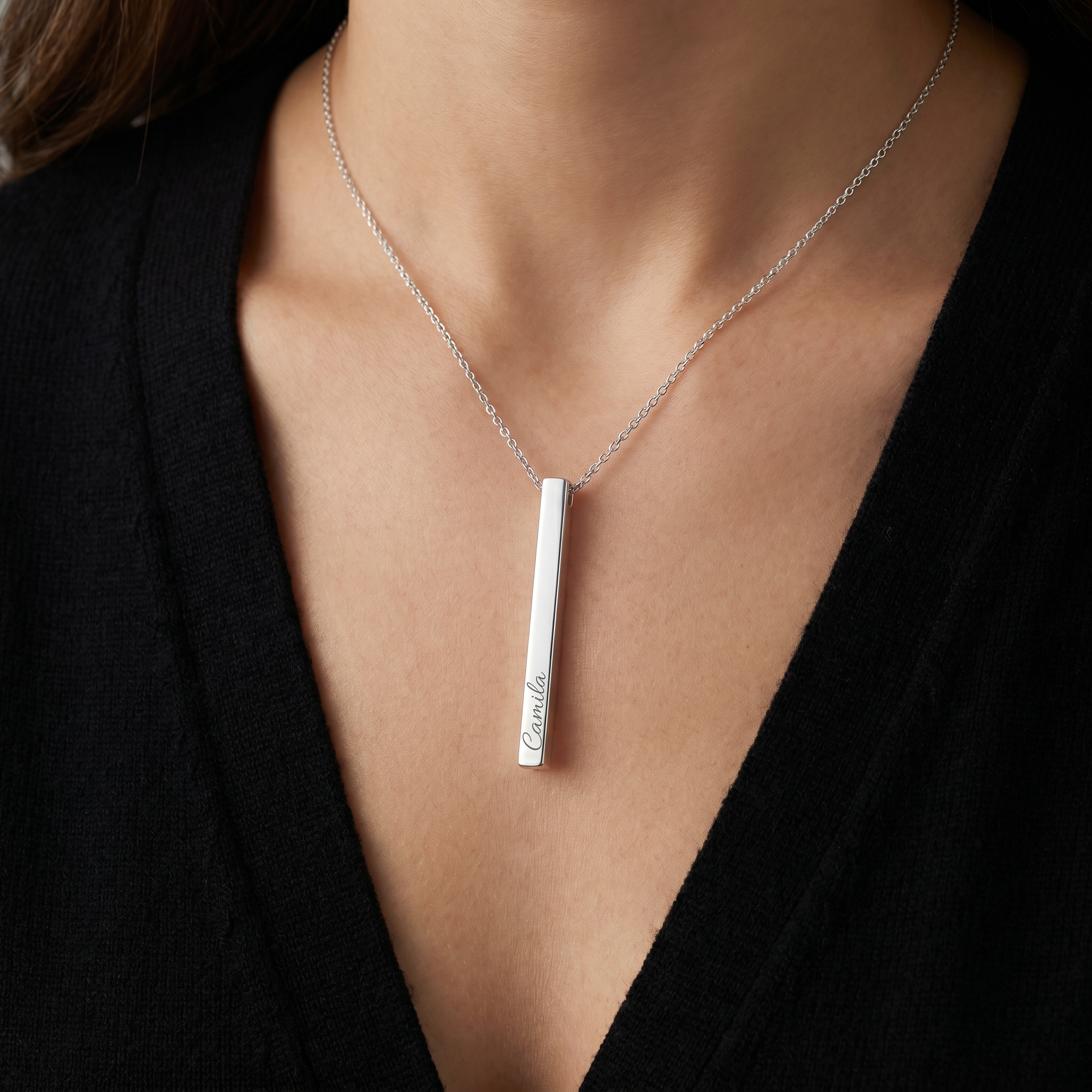 Silver vertical bar name necklace worn, hero
