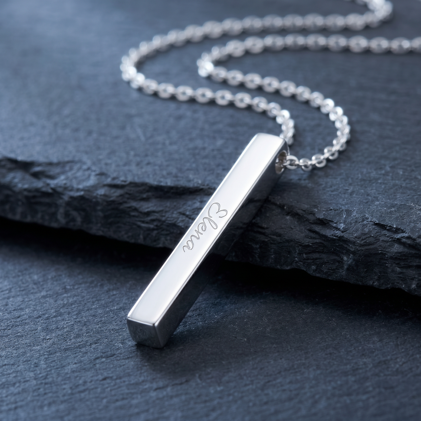 Silver vertical bar name necklace macro detail