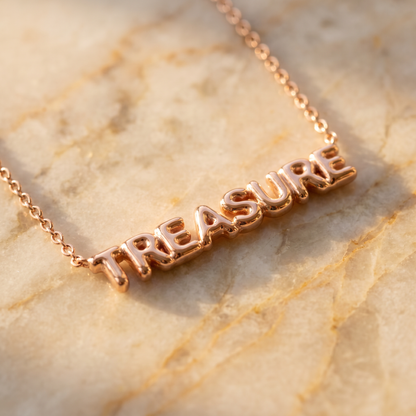 Rose gold puffy bubble-letter name necklace macro detail