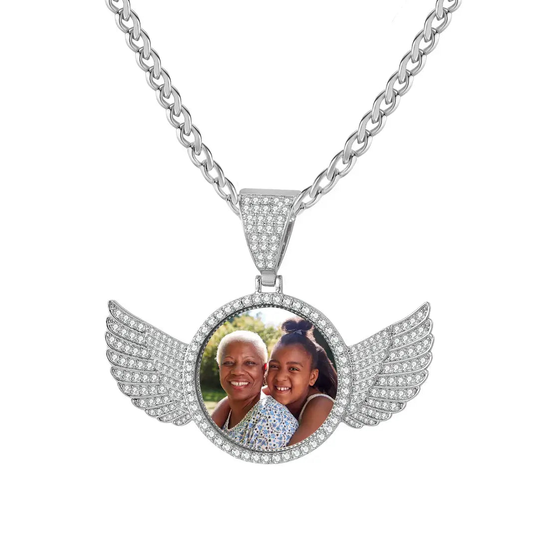 Iced Angel Photo Pendant Necklace by AUREATE featuring an angel-wing design and a cherished photo.