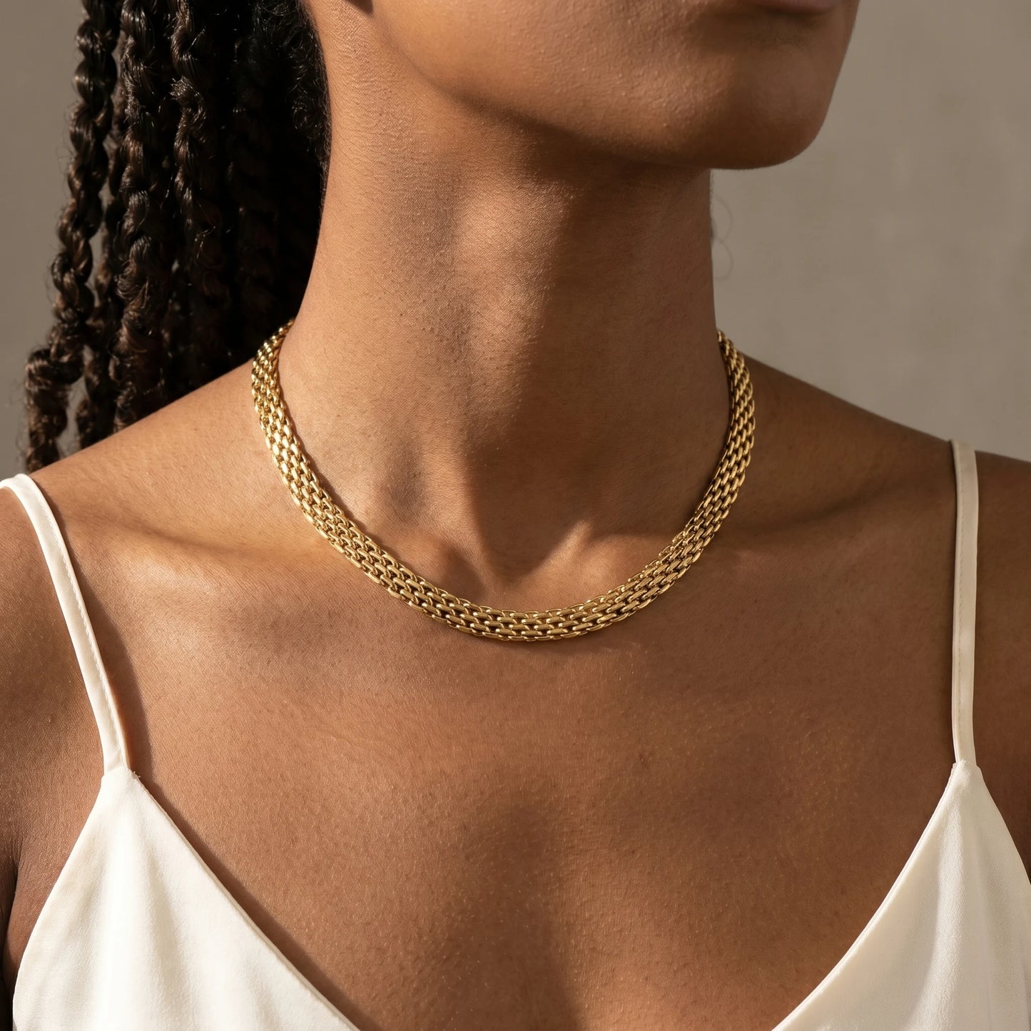 Mesh chain necklace 18K gold plated worn close-up at collarbone