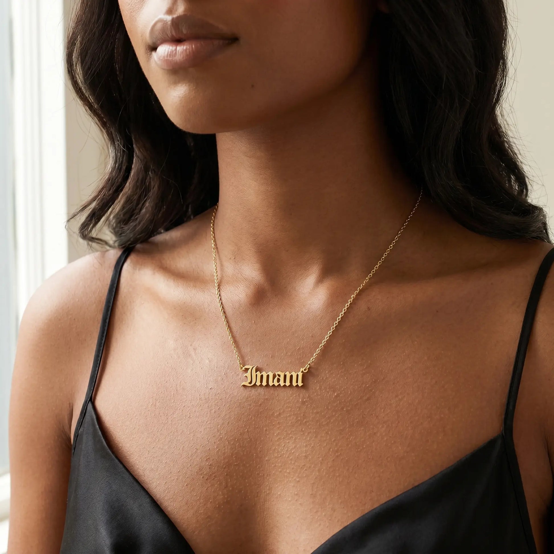 Old English Lettering Name Pendant — 18K Gold Plated — Studio close-up — IMANI