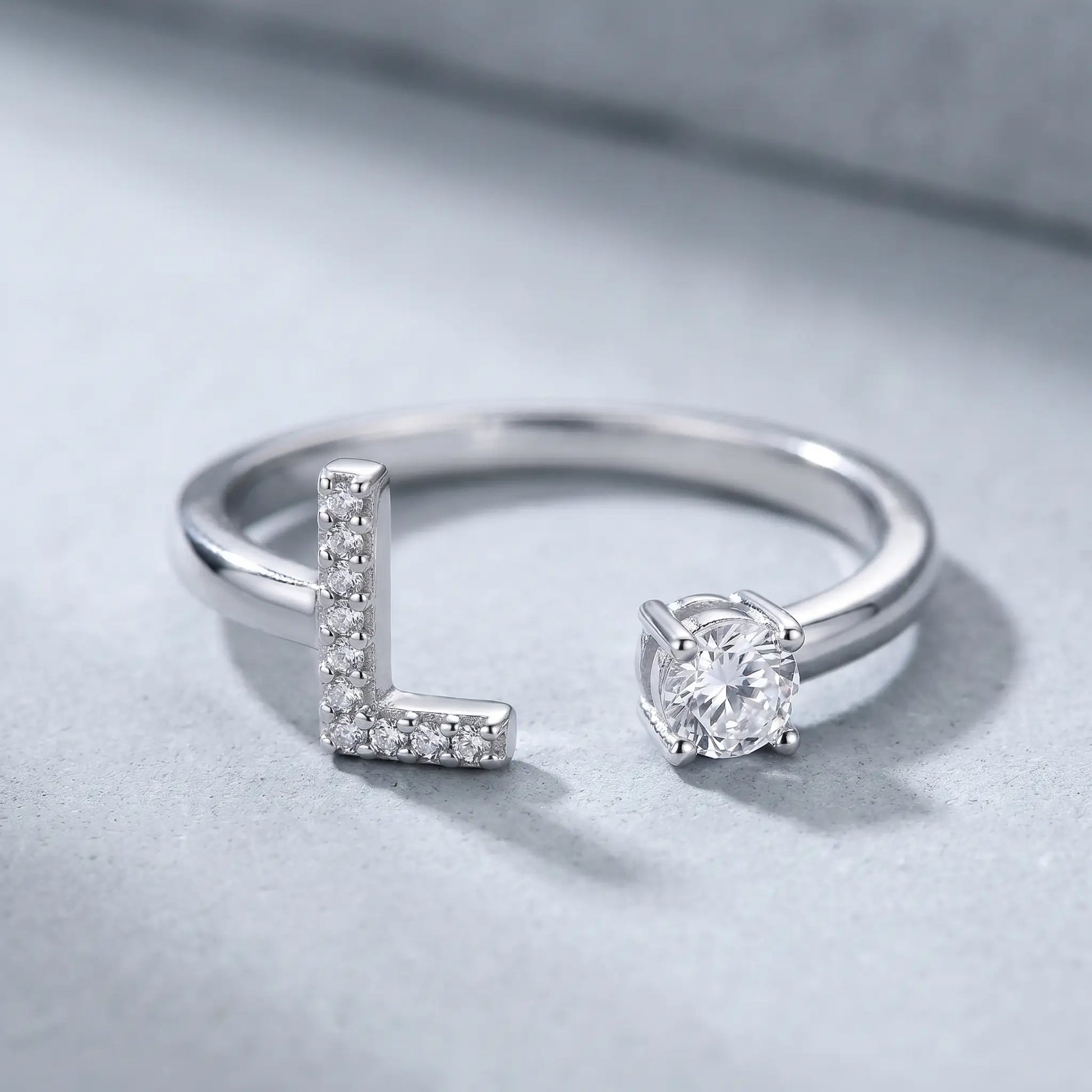 Crystal Initial Signet Ring Silver Tone macro detail pave letter L solitaire