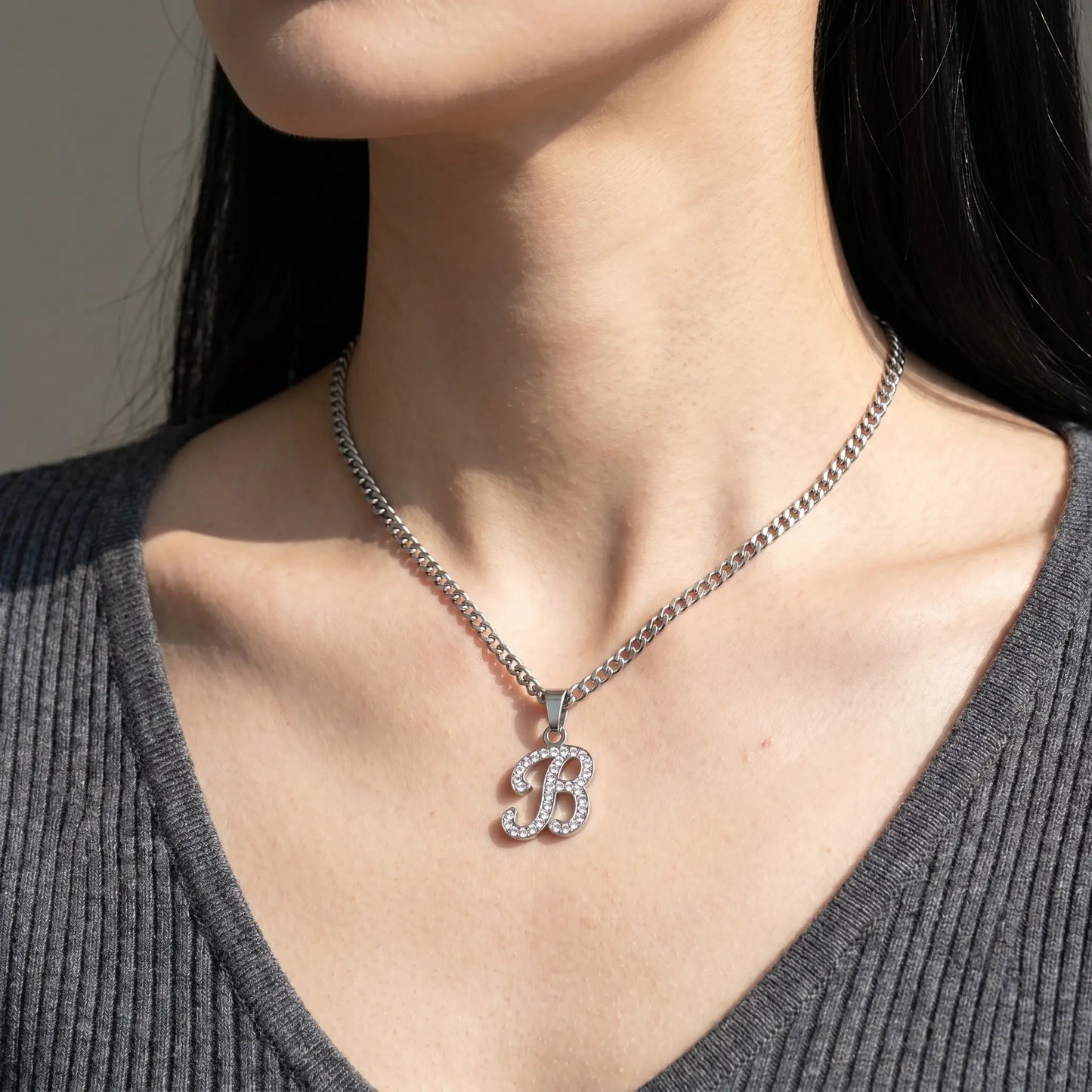 Crystal Script Initial Pendant Stainless Steel Silver Tone worn close-up cursive B pave crystal