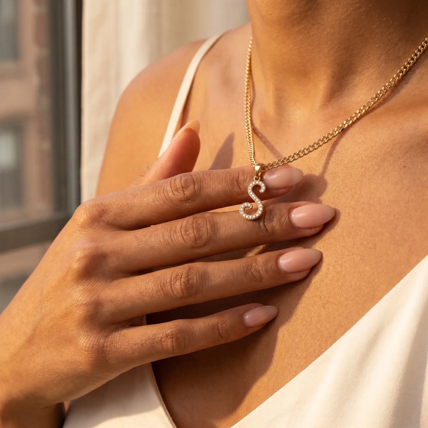Crystal Script Initial Pendant 18K Gold Plated lifestyle hand-to-pendant intimate tender Sofia