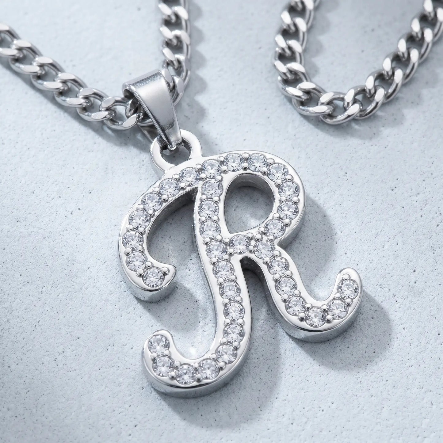 Crystal Script Initial Pendant Stainless Steel Silver Tone macro detail cursive R pave crystals