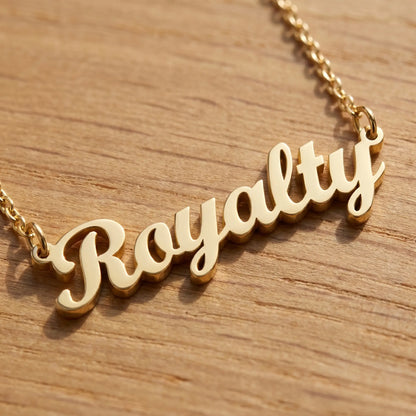 Personalised Plate Chain in 18K Gold by AUREATE featuring a 'Royalty' pendant in gold.