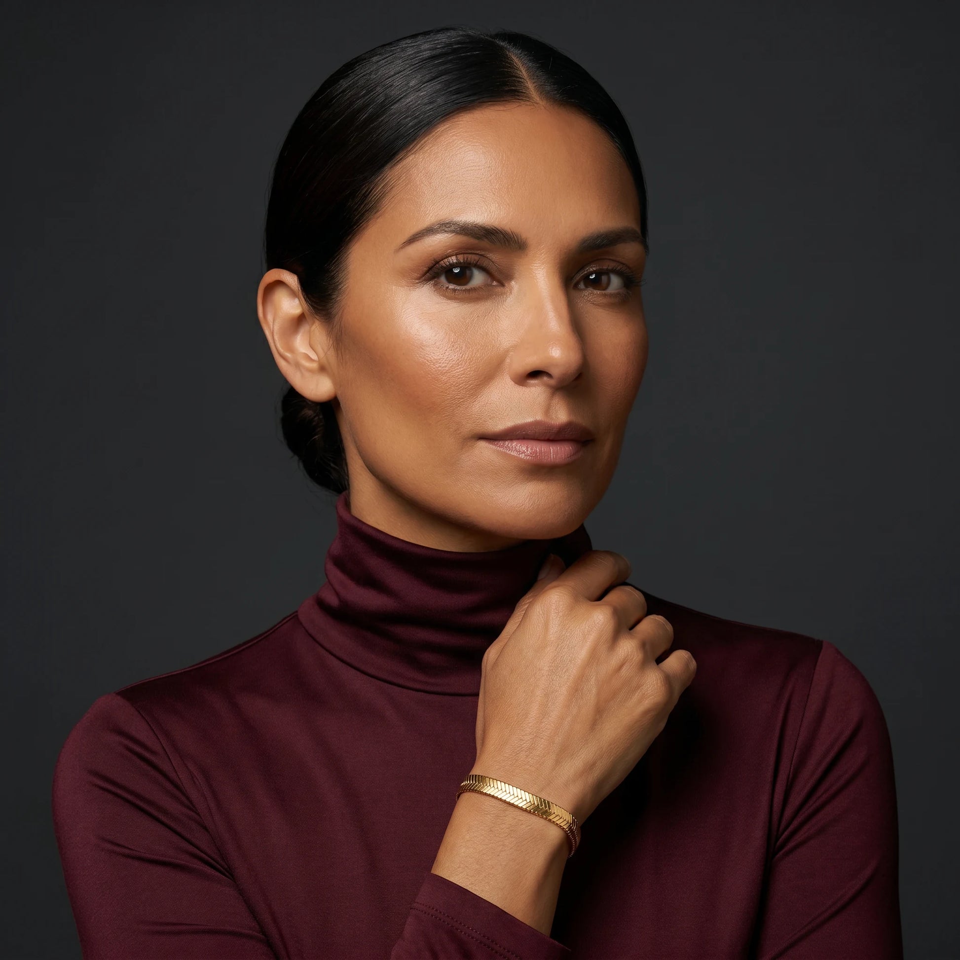 Gold herringbone bracelet editorial Vogue portrait