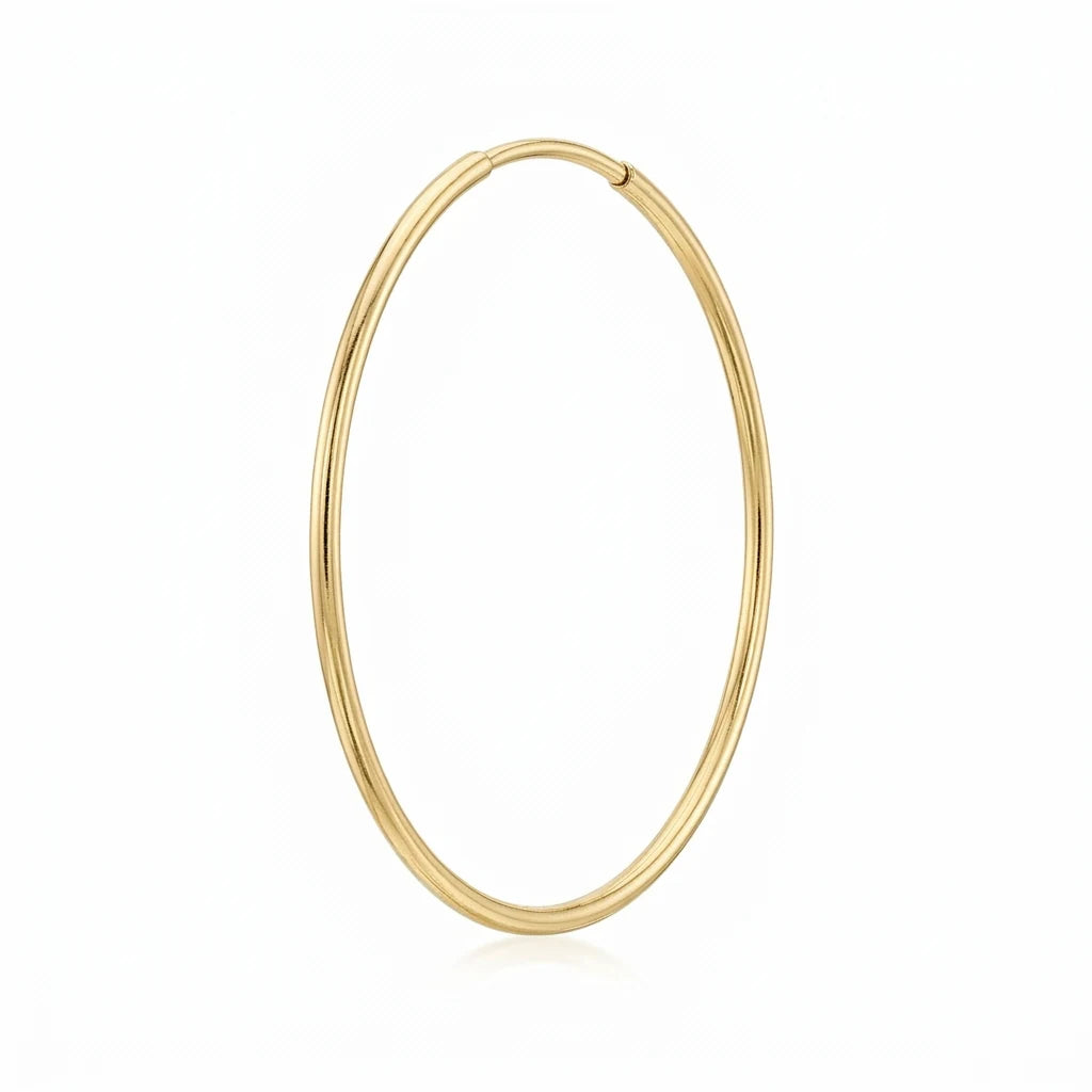 Timeless Gold Hoop Earrings single macro on white