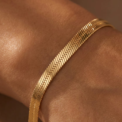 Gold herringbone bracelet macro weave detail