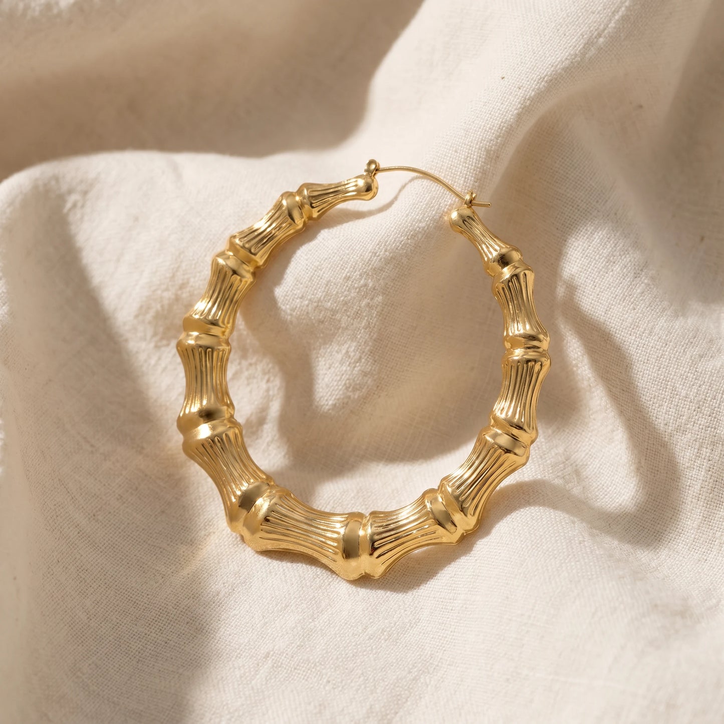 Reed-Ribbed Polished Round Earrings