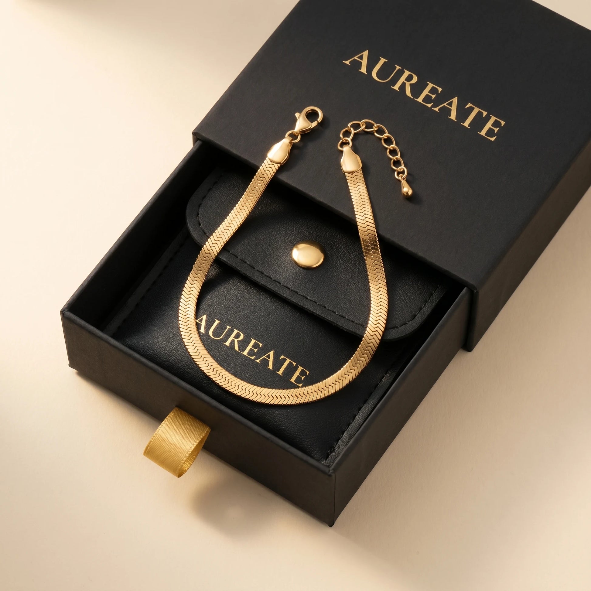 Gold herringbone bracelet in AUREATE matte black gift box