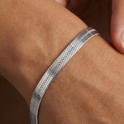 Silver herringbone bracelet macro weave detail