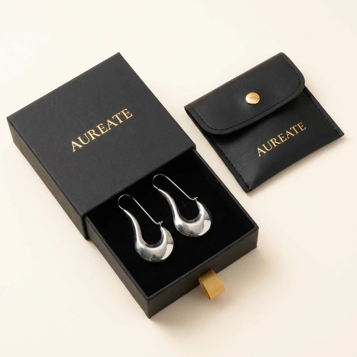 Silver tone stainless steel sculpted crescent drop earrings, in its gift box | SKU: AUR-SCPCRS-S