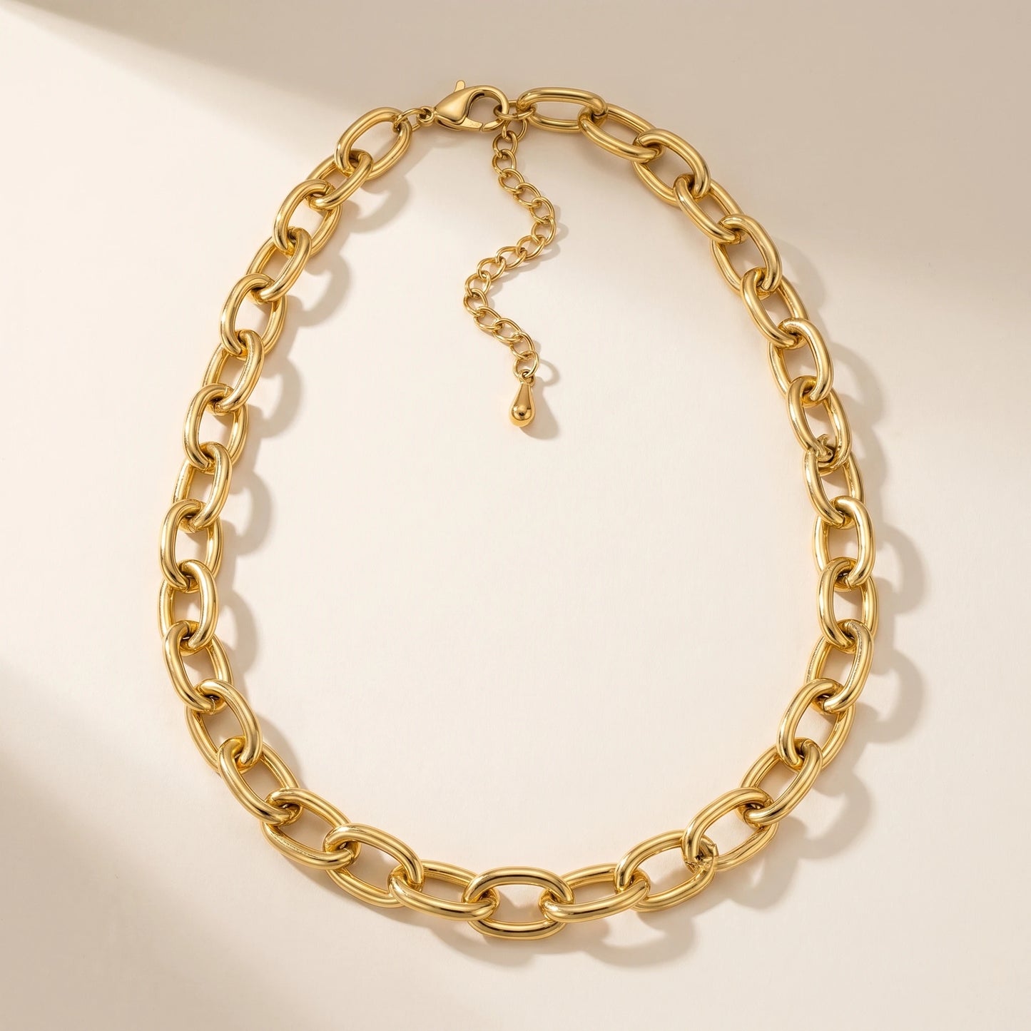 Chunky gold statement necklace XL oval cable chain packshot white background